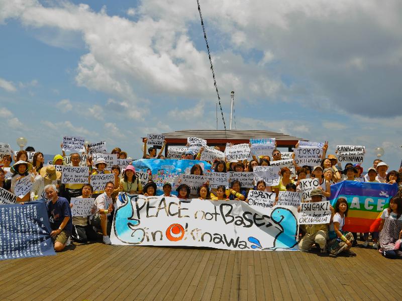 Peace No Base Action onboard Peace Boat